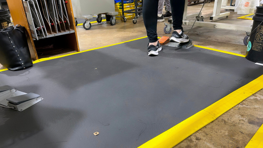 Red Wing Shoe Creates Anti-Fatigue Mat Standard